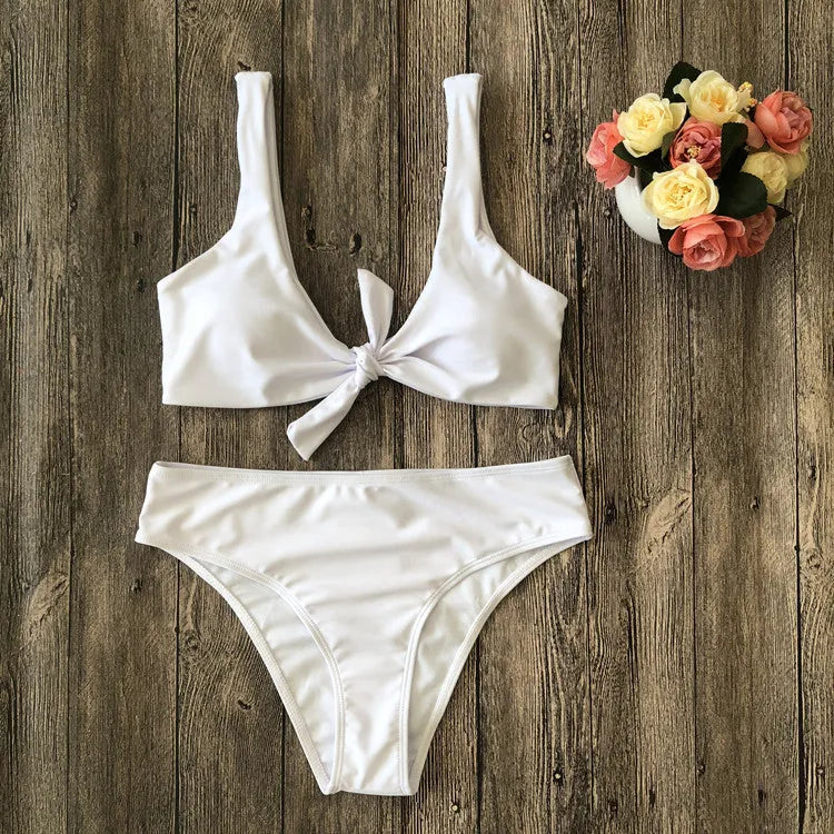 Ladies' polyester bikini set in solid red colour, showing bra top and briefs.