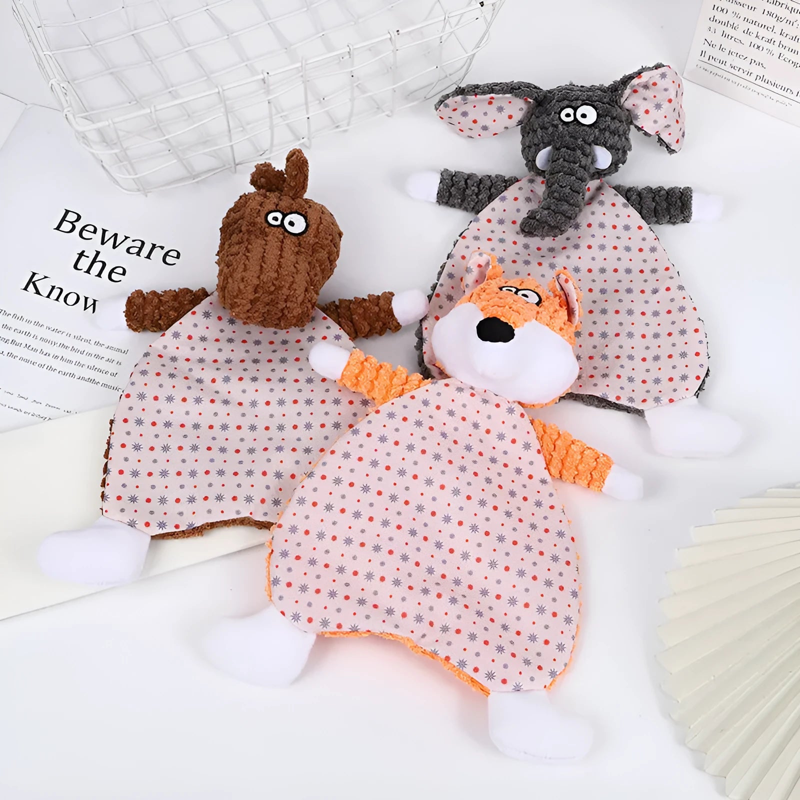 Brown plush fox dog toy with squeaker on a grey background.