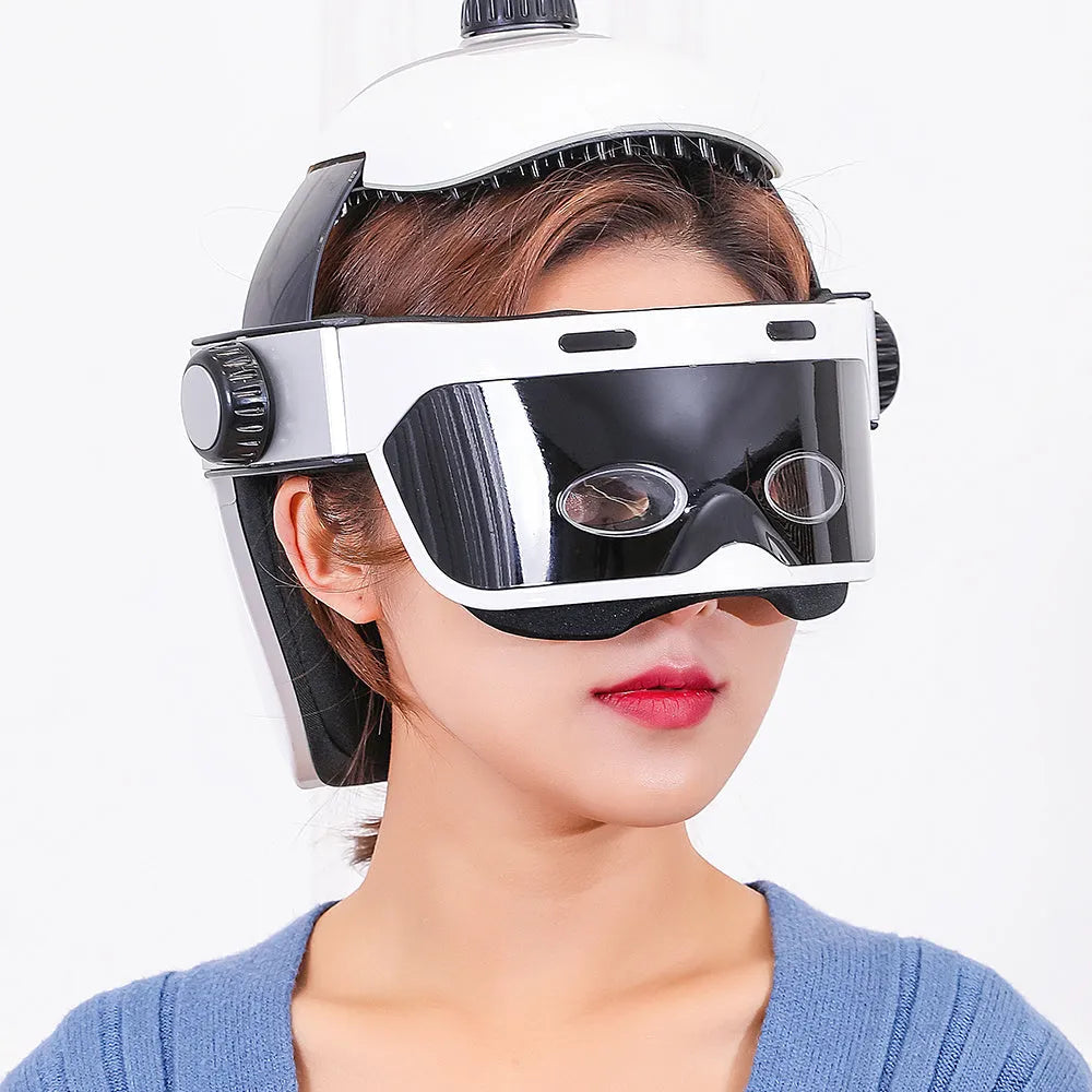 Electric eye massager in white and black with adjustable headband and LCD remote