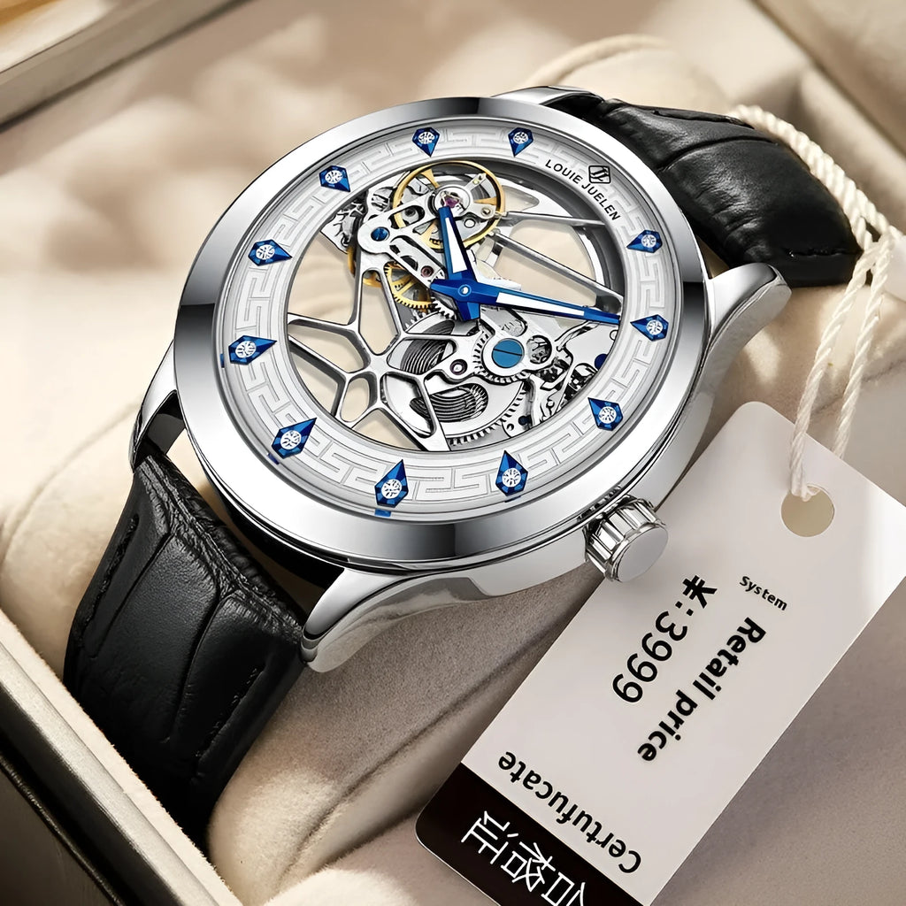 Men's silver mechanical watch with white dial, blue hands, and black genuine leather strap