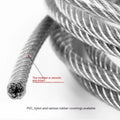 Close-up of a coated stainless steel anti-theft security cable showing its multi-strand construction.