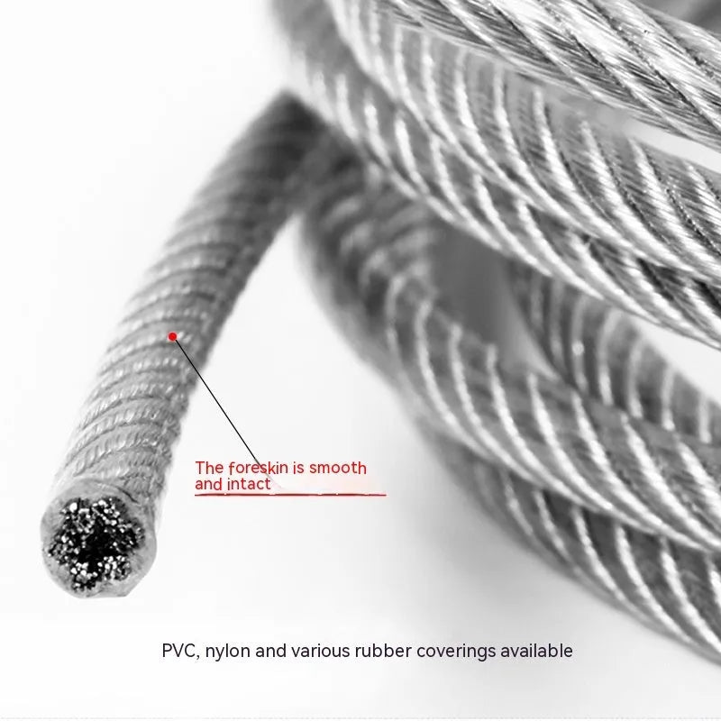 Close-up of a coated stainless steel anti-theft security cable showing its multi-strand construction.