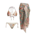 Creamy-white women's floral print bikini set with matching skirt on a hanger.
