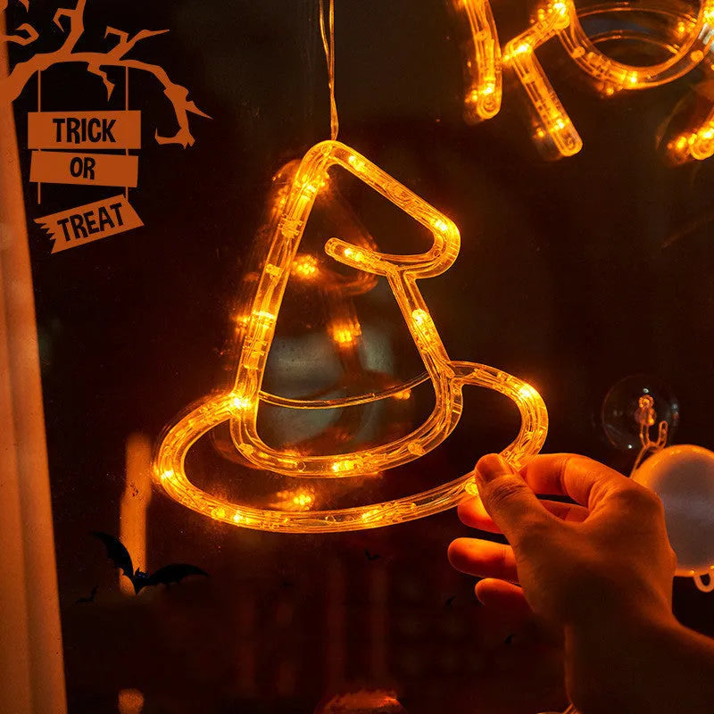 Halloween window hanging LED lights with spider, pumpkin and ghost designs on suction cups