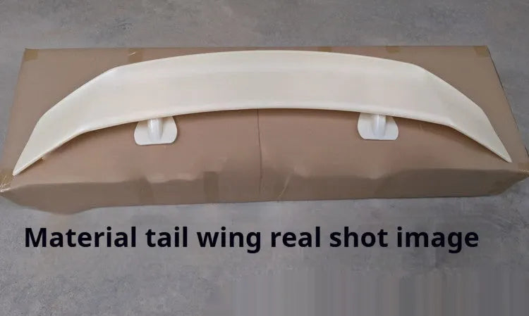 Universal punch-free ABS plastic car spoiler tail wing in bright black finish.
