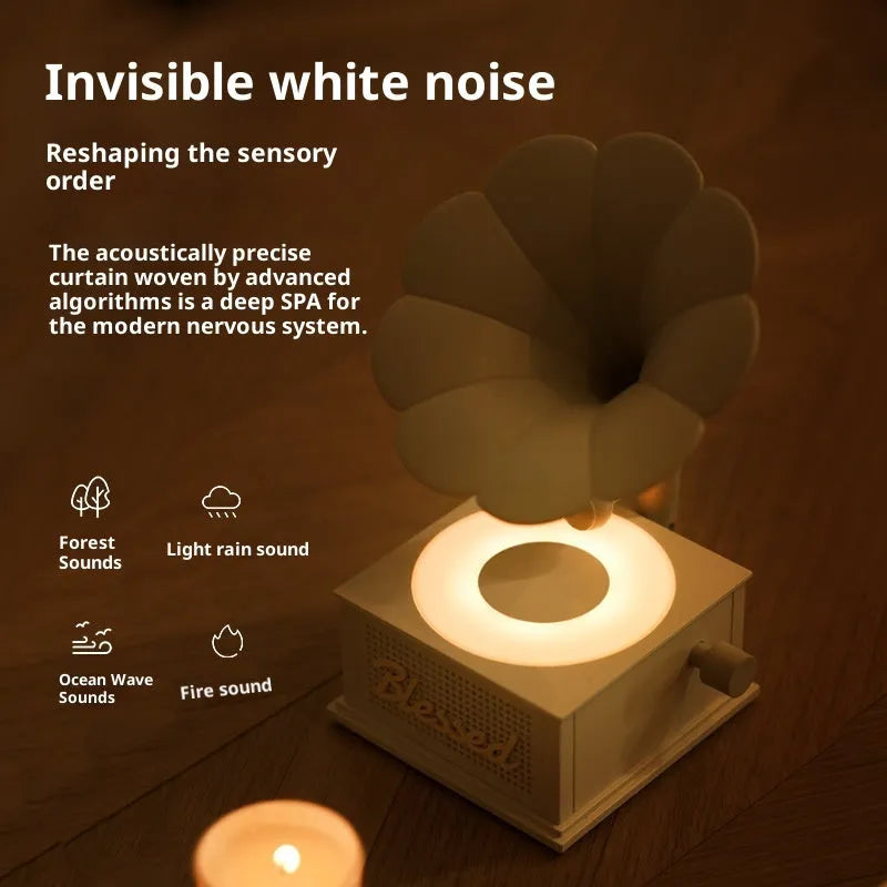 Retro white noise bluetooth speaker in black red, gray white, and lotus pink on a surface