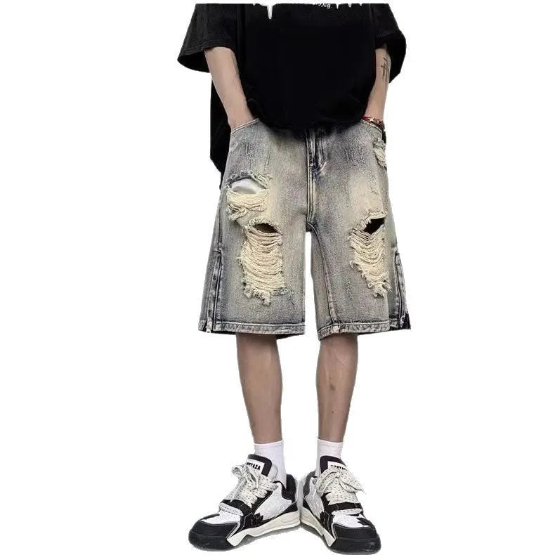 Blue retro denim shorts with a wide-leg loose fit and tattered distressing on the legs.
