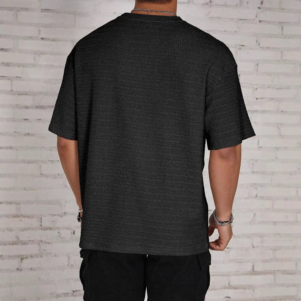 Men's slim-fit solid colour t-shirt in light blue with round neck and short sleeves