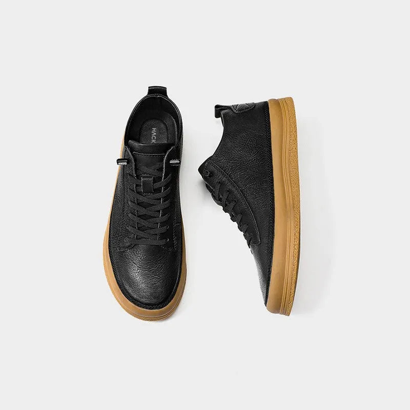 Men's black casual leather shoes with round toe, flat heel, and lace-up closure