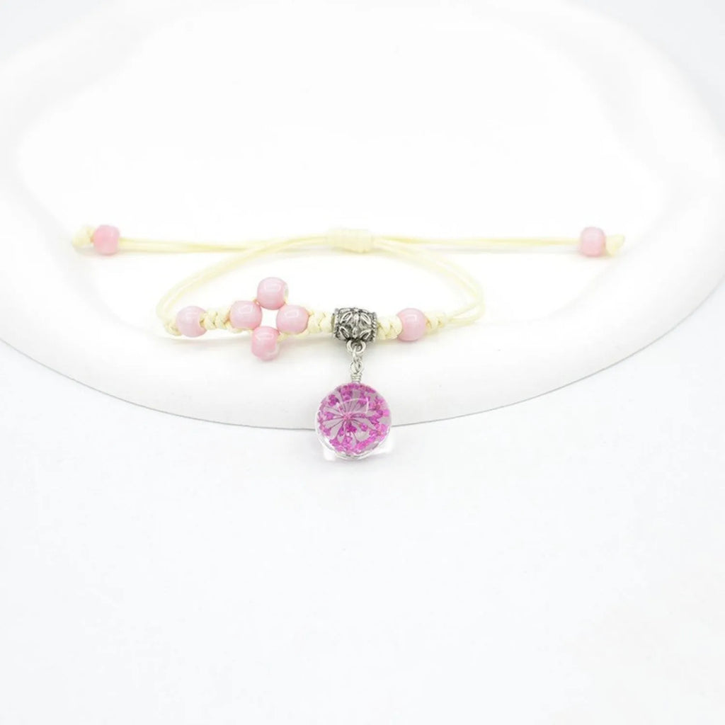 Glass bracelet with dried flowers inside 1.4cm beads on lace-style band in multiple colour options