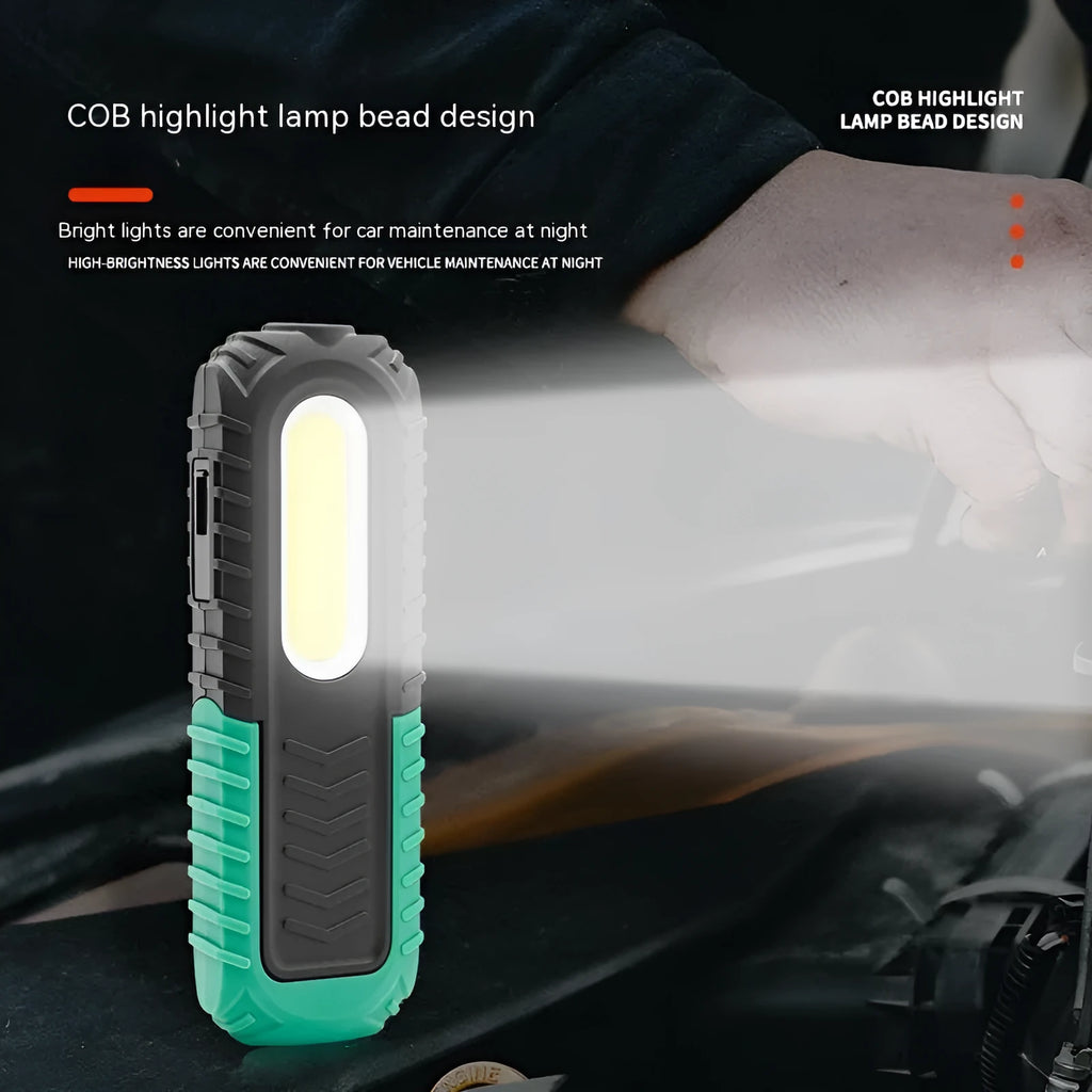 Black and green auto repair work light with USB charging cable