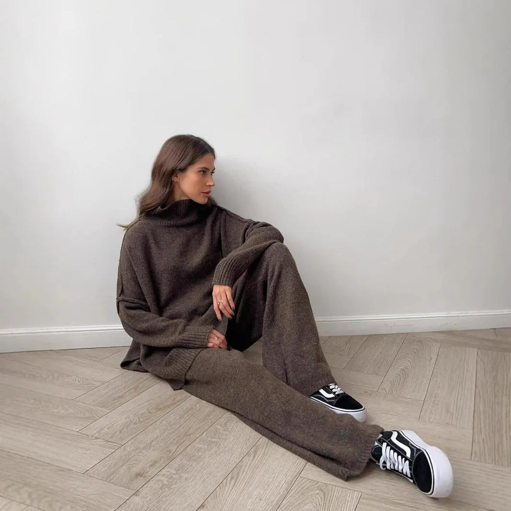 Women's long-sleeved acrylic sweater and matching trousers suit set in solid colour