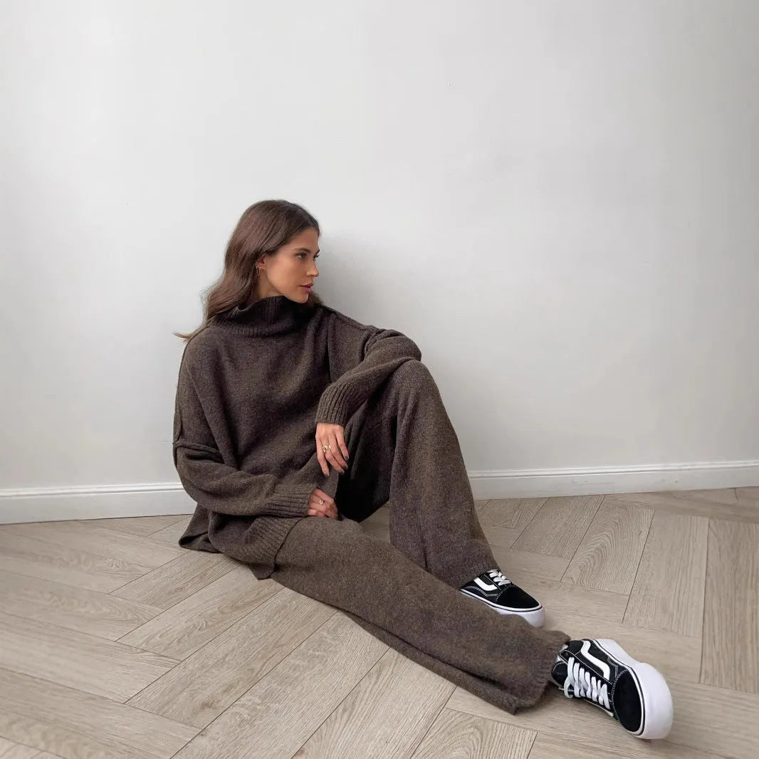 Women's long-sleeved acrylic sweater and matching trousers suit set in solid colour