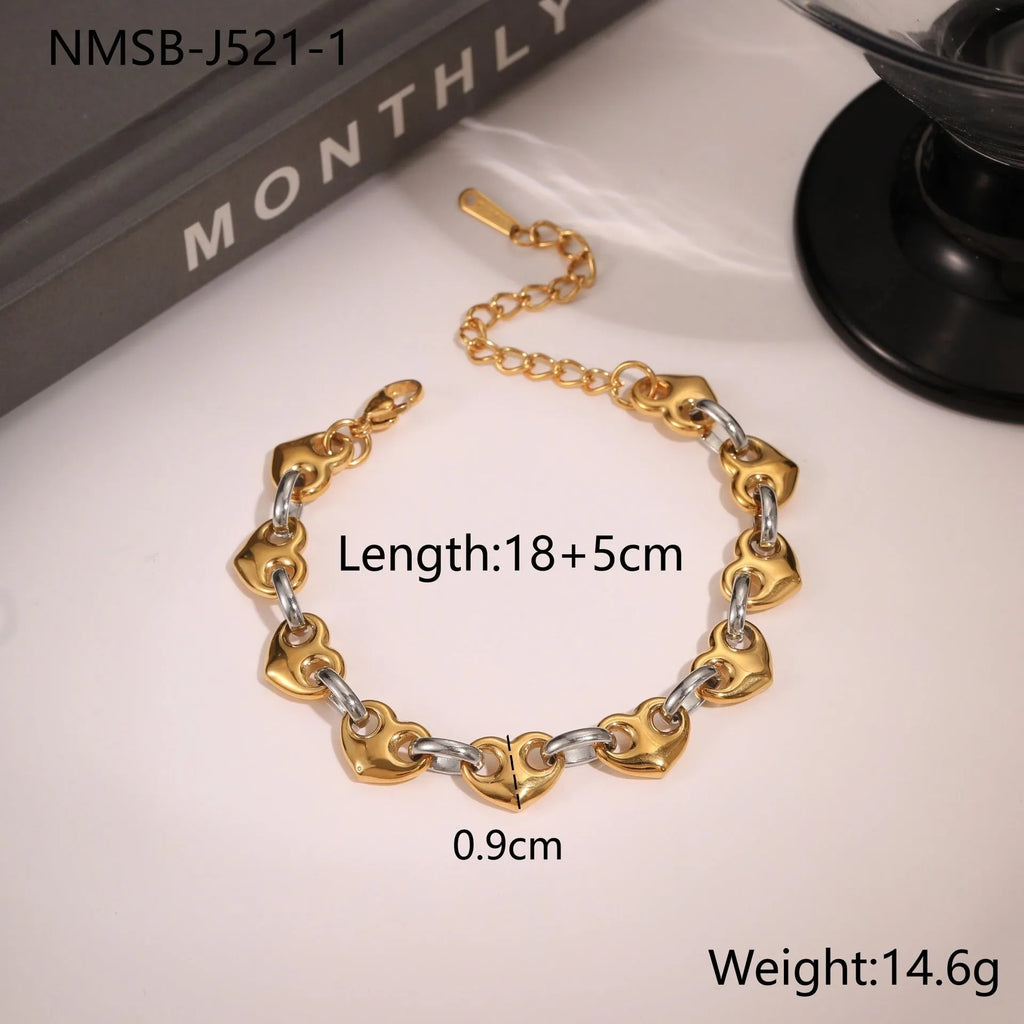 Stainless steel hollowed-out heart bracelet with electroplated finish in gold, steel or colour block options.