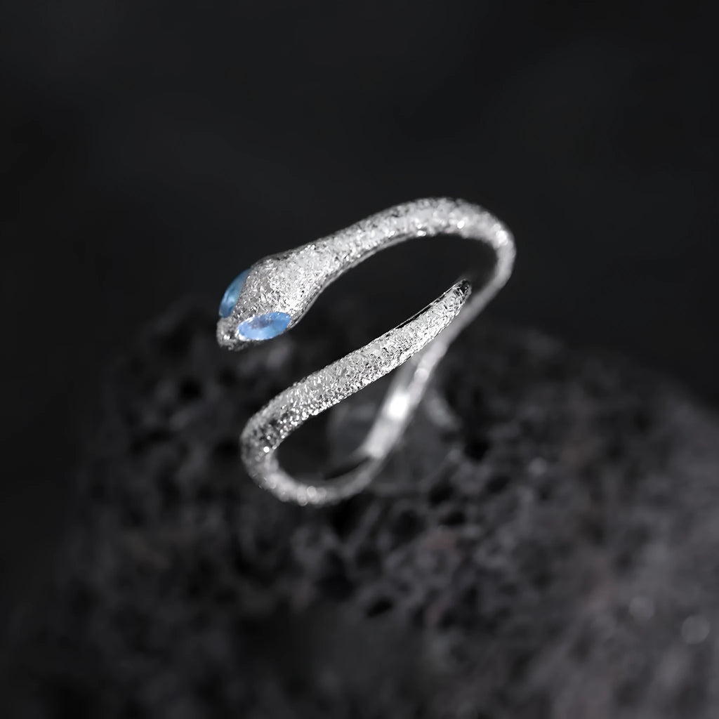 Silver snake zodiac ring with adjustable opening in white gold colour