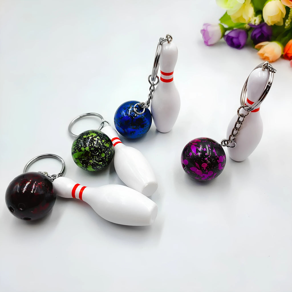 Mini bowling pin keychain pendant in PVC metal available in four colours