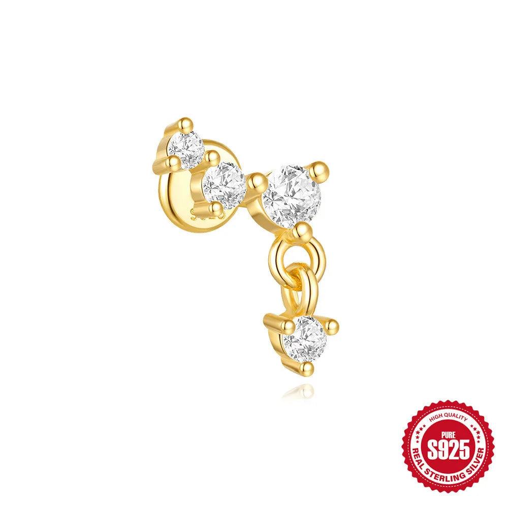 S925 sterling silver geometric moon and star earrings in a gold colour on a white background