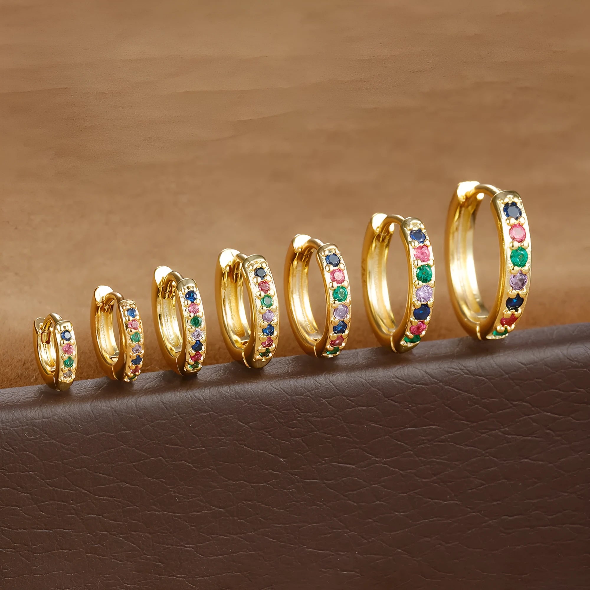 Circle geometric zircon stud earrings in gold, rose gold, or silver colour on a copper base.