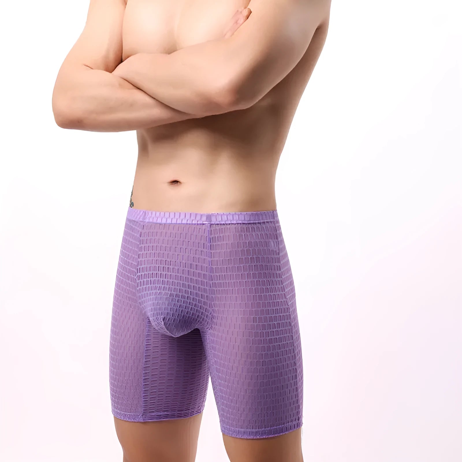 Men's lace boxer shorts in nylon fabric on a mid-waist mannequin, showing transparent knitted construction.