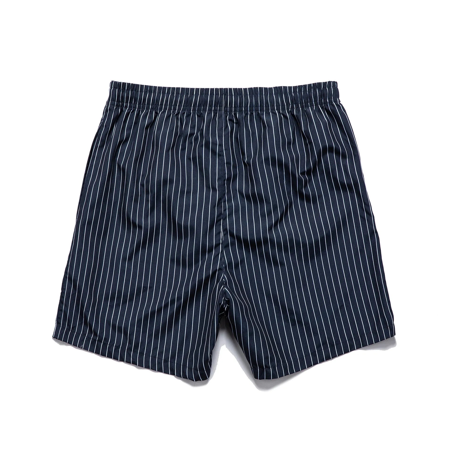 Polyester fibre striped beach shorts in navy blue with straight leg opening