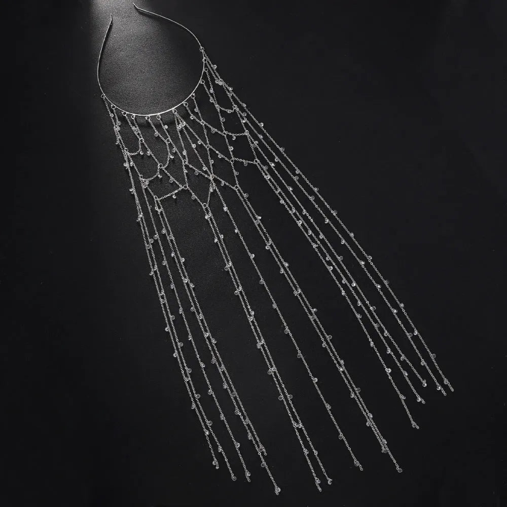 Gold rhinestone headband with dangling tassel mesh for formal hairstyles.