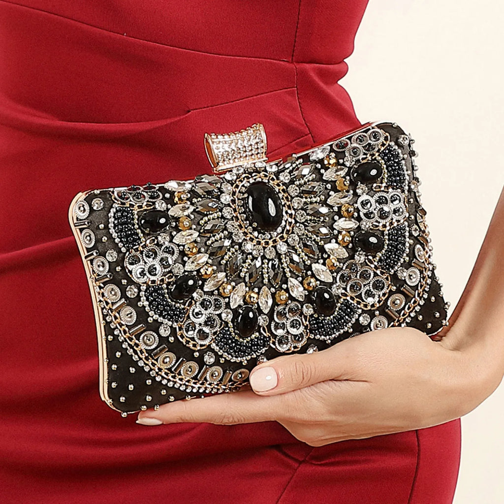 Retro hard shell dinner bag with pearl embroidery and beading in white, showing three-dimensional pocket and hand-held design