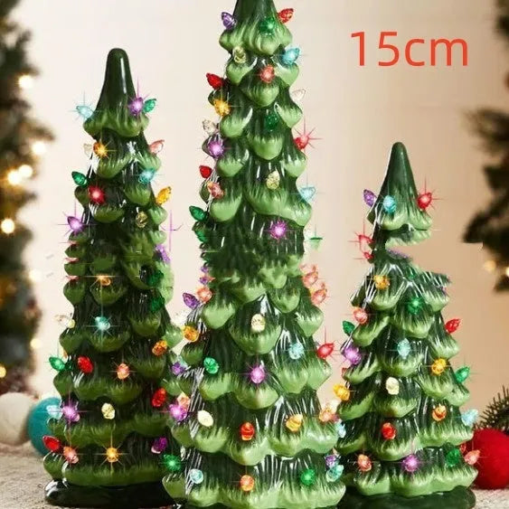 Resin and plastic Christmas tree decorative light ornament in European style, shown in coloured or warm light.