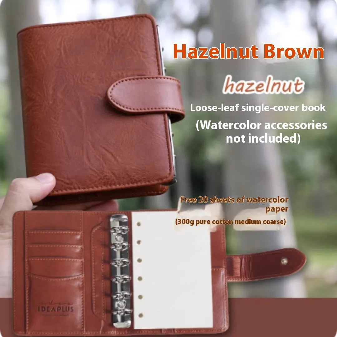 A7 size loose-leaf watercolour notebook in one of five colours: Avocado Green, Hazelnut Brown, Mango Pudding, Mocha Coffee, or Rainforest Green.