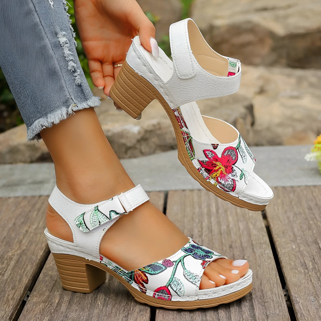 White women's high-heel casual sandals with an adjustable Velcro strap buckle.