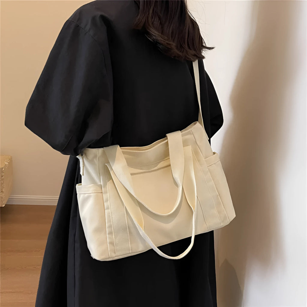 Large capacity polyester canvas shoulder tote bag in solid colour with phone compartment