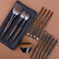 12-piece makeup brush set with wooden handles in portable PU carrying case