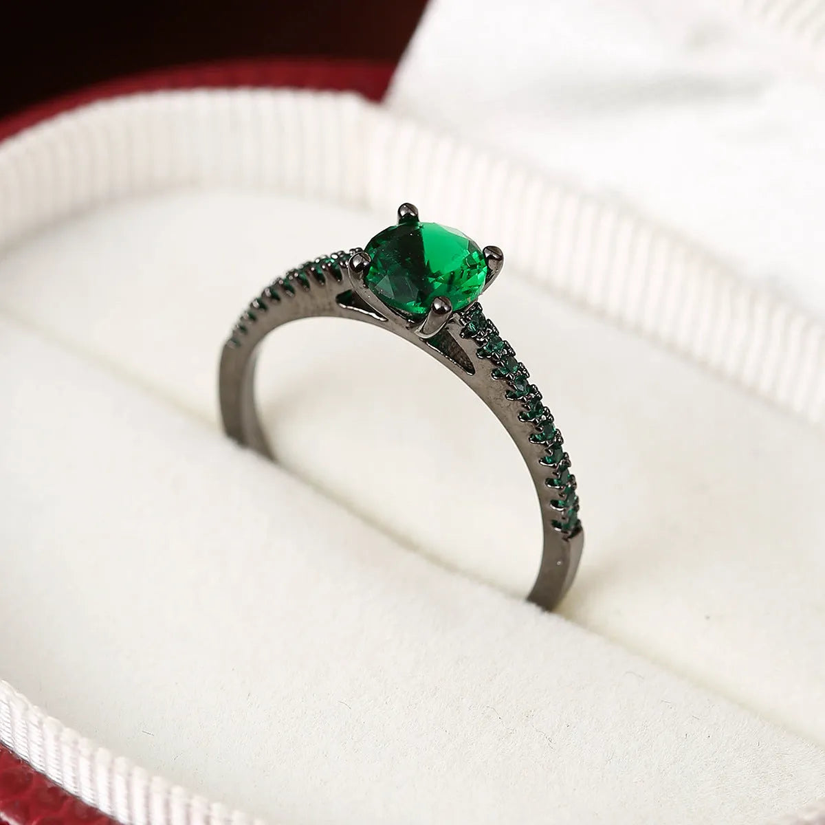 Hexagonal geometric zircon ring in copper with electroplated finish showing angular design and zircon stone