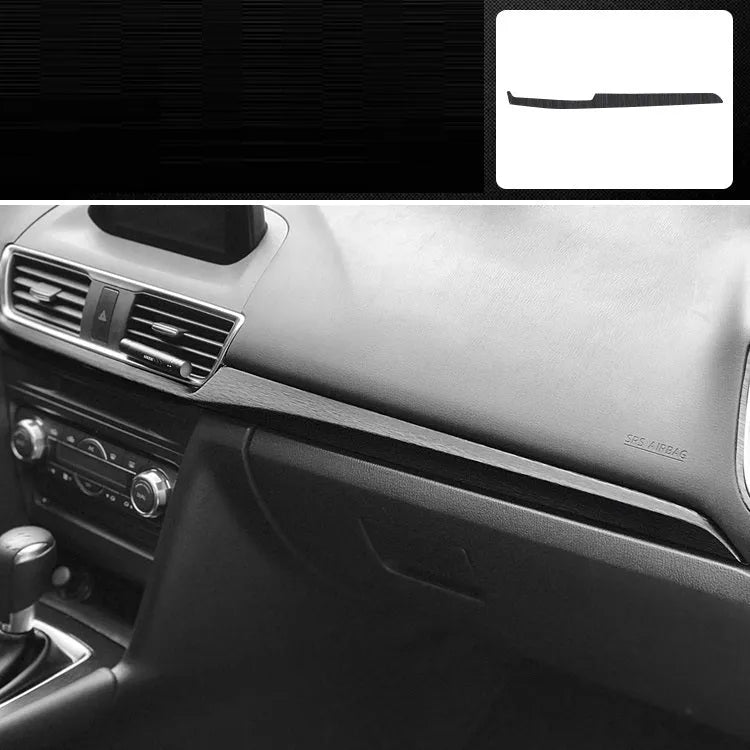 Car interior decorative film sticker kit showing carbon fibre pattern applied to centre console and dashboard