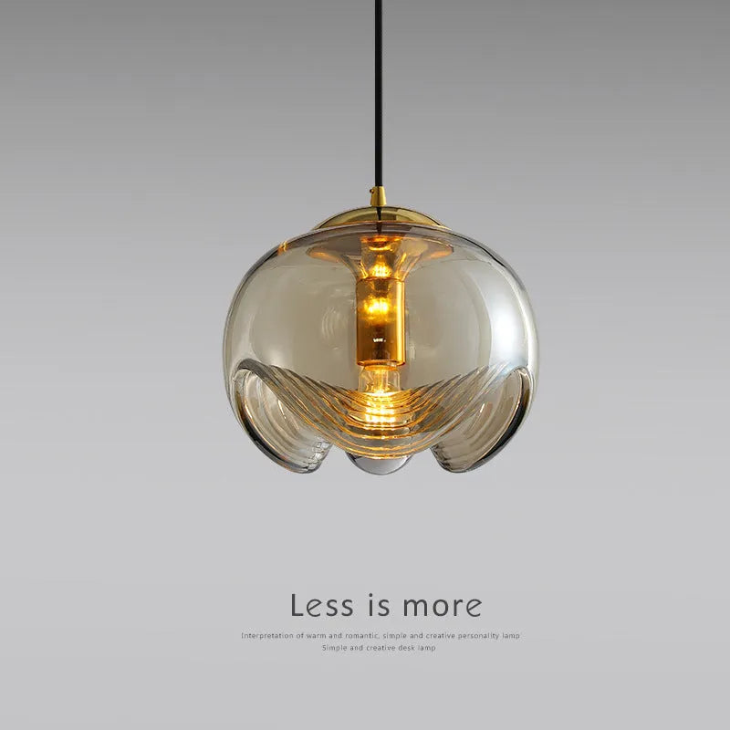 Modern minimalist glass bedside chandelier with a 250mm diameter, shown in a transparent light colour option.