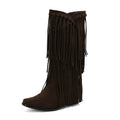 Women's suede knee-high boots with a chunky heel, square toe, and tassel detail on a waterproof platform sole.