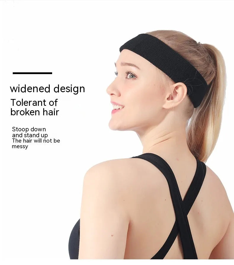 Elastic solid colour sports sweatband in black, shown stretched to demonstrate fit.