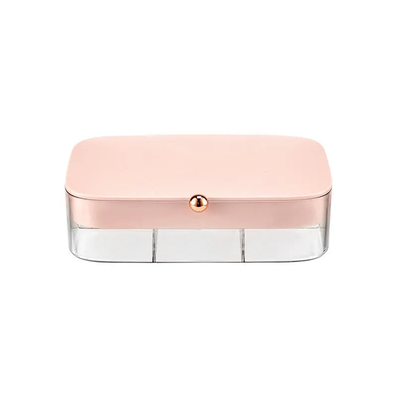 Modern minimalist green jewellery storage box with multi-layer compartments open on a dressing table.