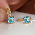 Geometric quadrilateral copper ear clips with moissanite stone inlay and electroplated gold finish