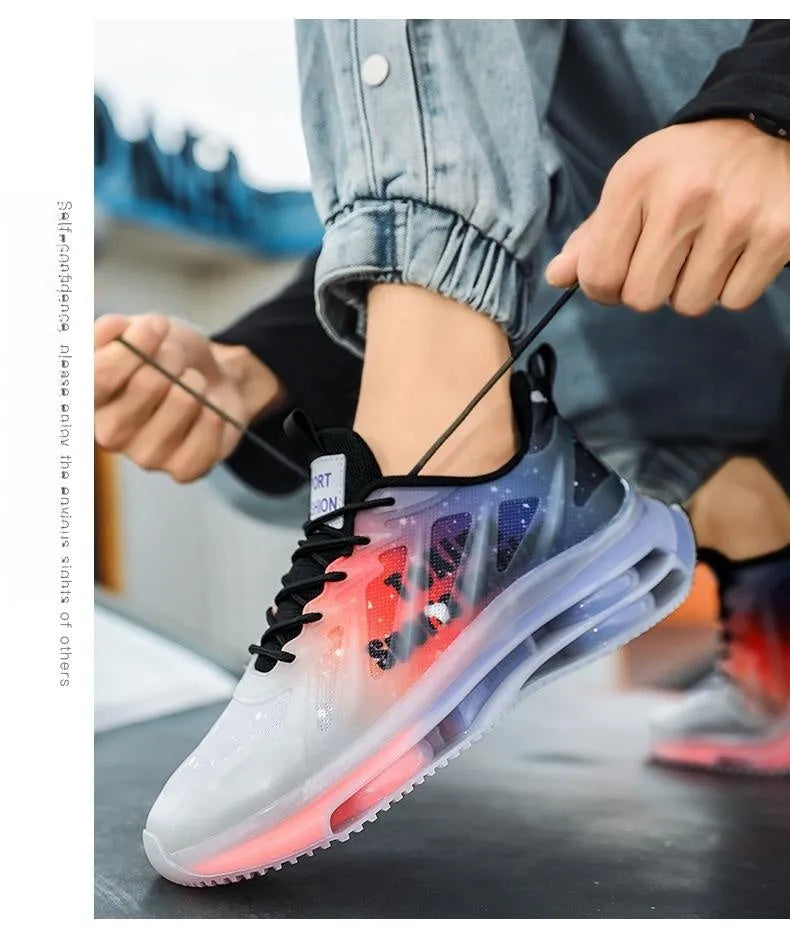 Men's grey and orange platform casual sneakers with mesh upper and lace-up front.