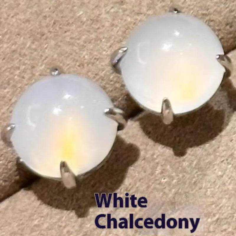 Chalcedony stud earrings with round egg stone in copper four-claw setting, emerald green colour