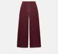 Women's black polar fleece suit set with pleated O-neck long sleeve top and wide leg trousers