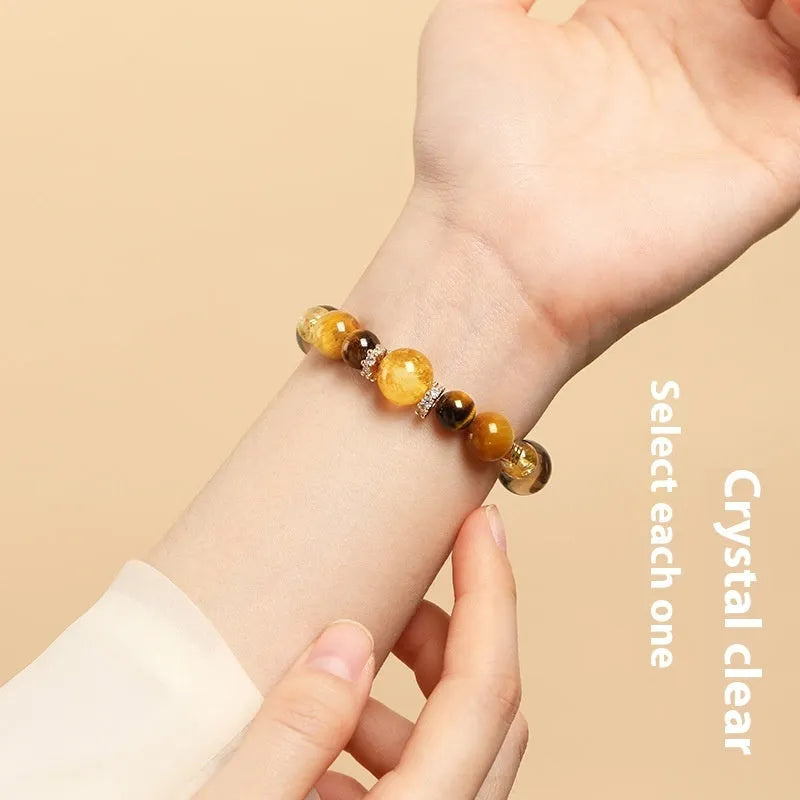 Unisex tiger-eye crystal bracelet with geometric yellow tower beads in 10mm or 12mm size options.