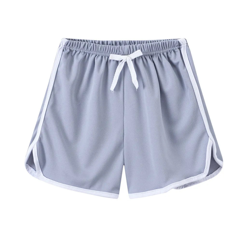 Children's casual polyester shorts in assorted colours and prints like pineapple, kitten, and stripes for beach wear.