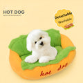 Sofa-style hot dog pet bed with raised sides and a removable cushion in a coffee colour.