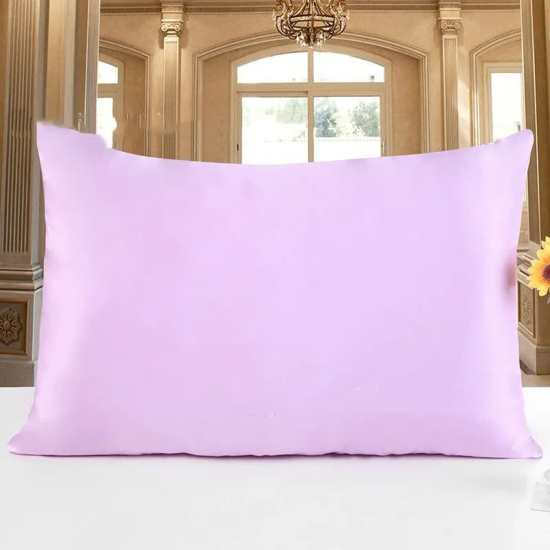 Double-sided 19 M silk pillowcase in apricot colour, showing smooth satin weave texture.