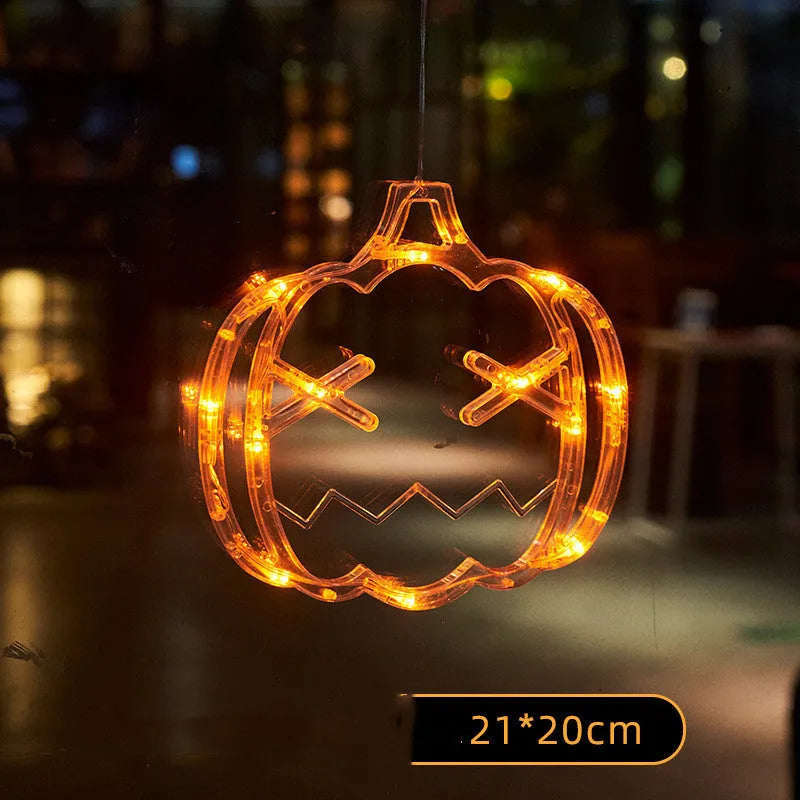 Halloween window hanging LED lights with spider, pumpkin and ghost designs on suction cups