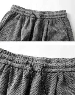 Plus size straight-leg trousers with fleece lining in light grey, dark grey, or black.