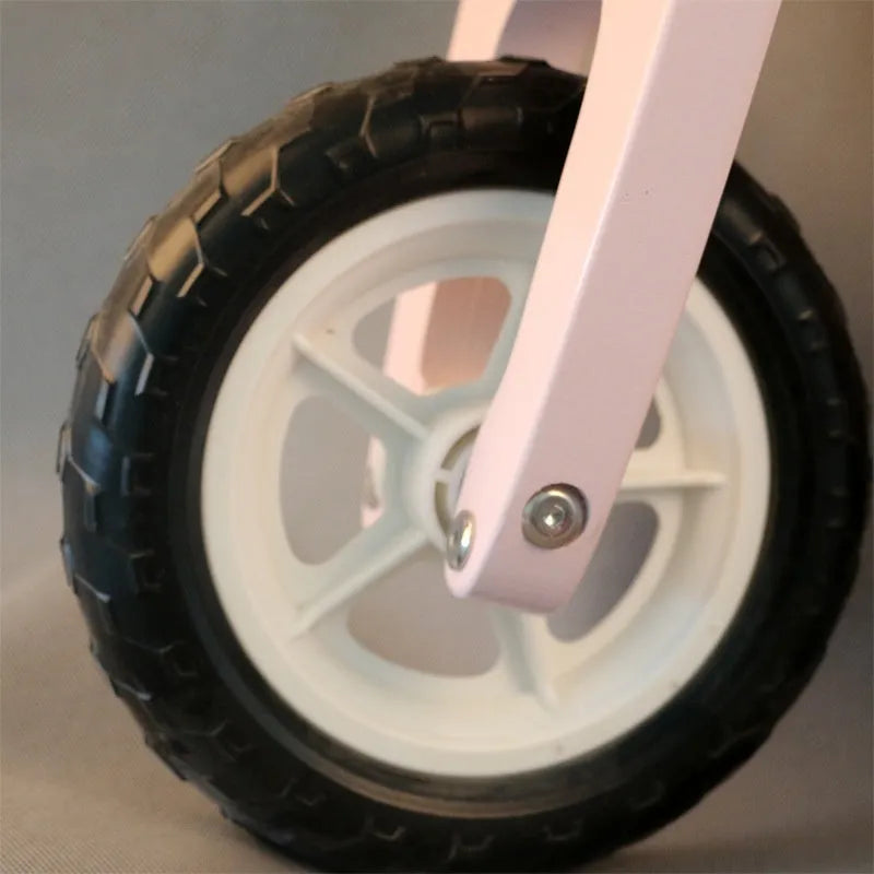 Pink wooden balance scooter for toddlers with 10-inch wheel