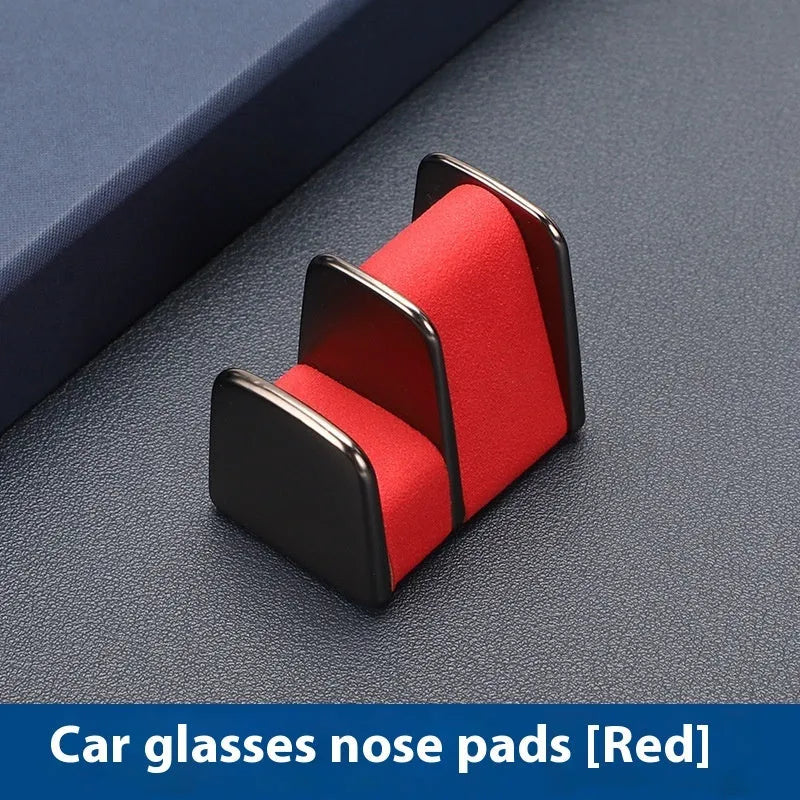 Compact zinc alloy and leather glasses clip for car dashboard, shown in available colours.