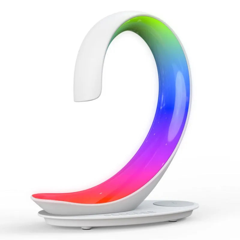 White swan shaped desktop wireless charger with Bluetooth speaker and colourful atmosphere lighting